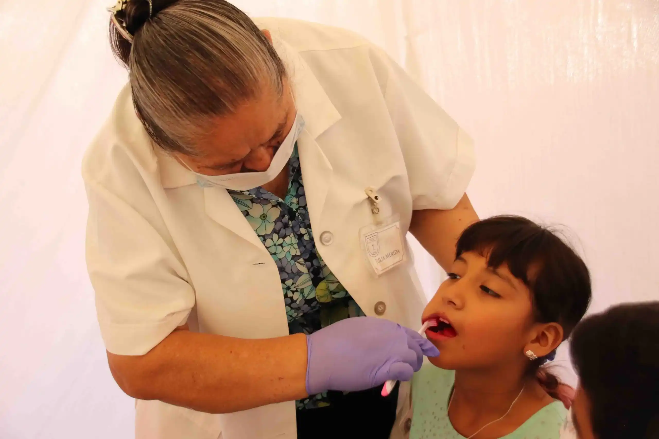 Volunteer providing care during outreach